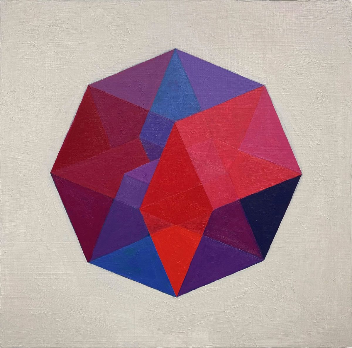 A three dimensional hexagonal shape with a star-like appearance.