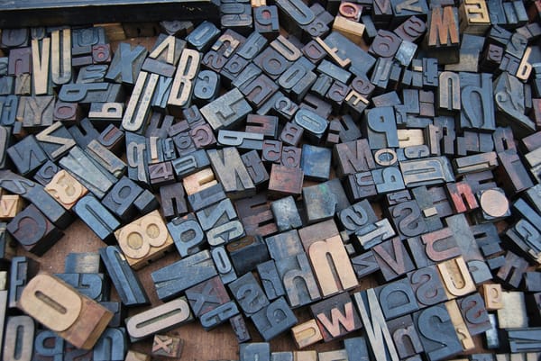 Some jumbled letter and number stamps 